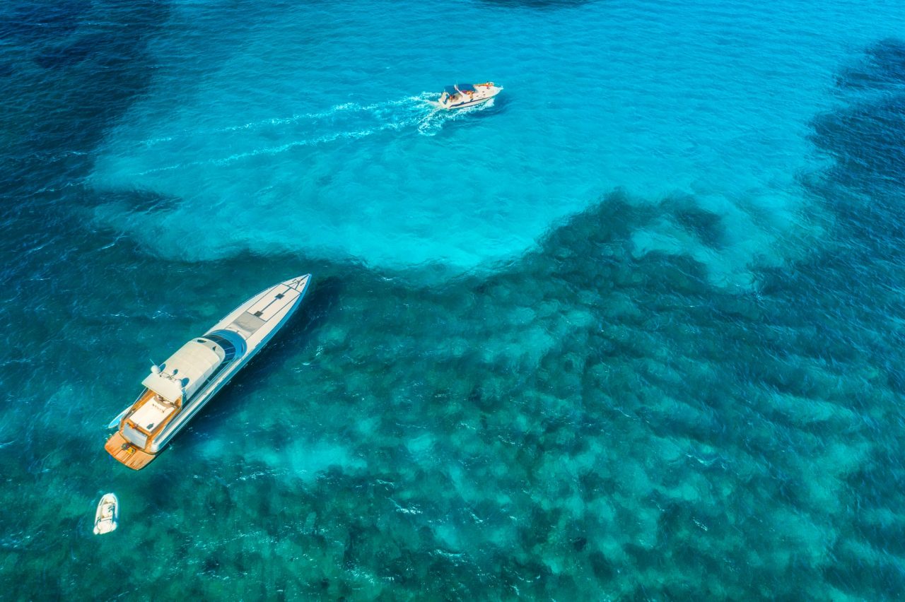 aerial-view-of-luxury-yachts-in-transparent-blue-sea.jpg
